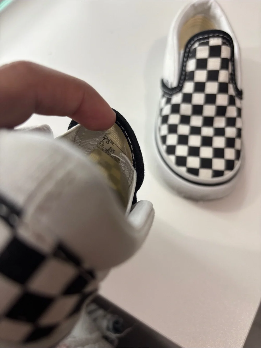Vans Kids Black & White Checkerboard Slip-On Sneakers